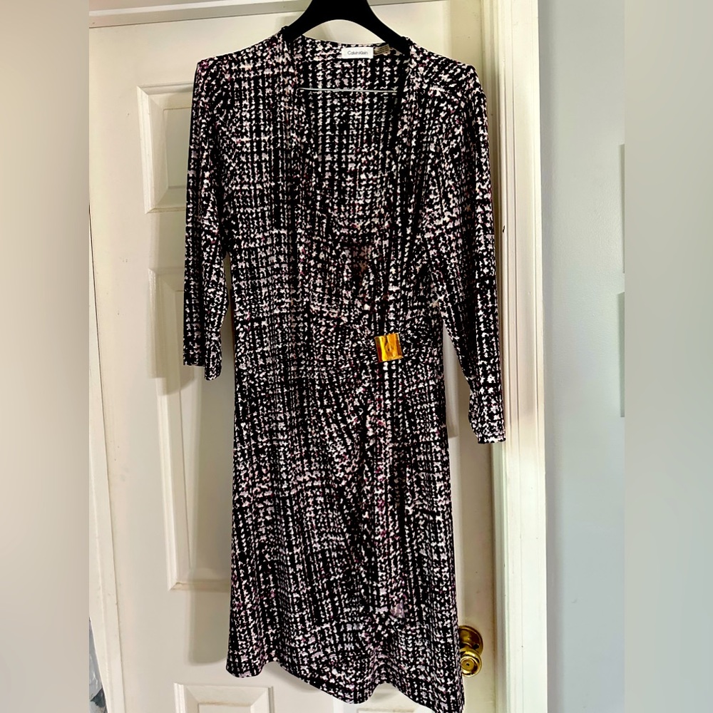 Women’s Calvin Klein, gently used, faux wrap dress. Size 16.